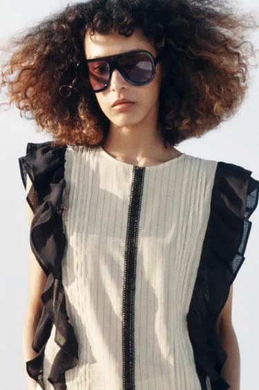 Блуза в полоску с воланами- Заказать в России