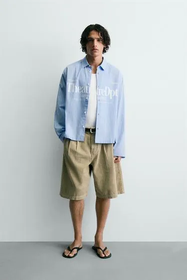 Рубашка Relaxed Fit в клетку с надписями- Заказать в России