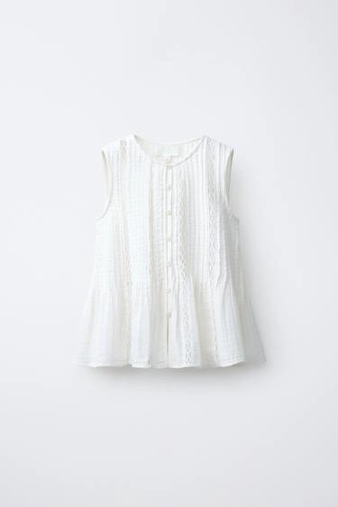 Блузка с кружевными вставками и завязками- Заказать в России