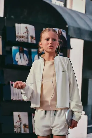 Шорты-бермуды в рубчик с контрастными деталями- Заказать в России