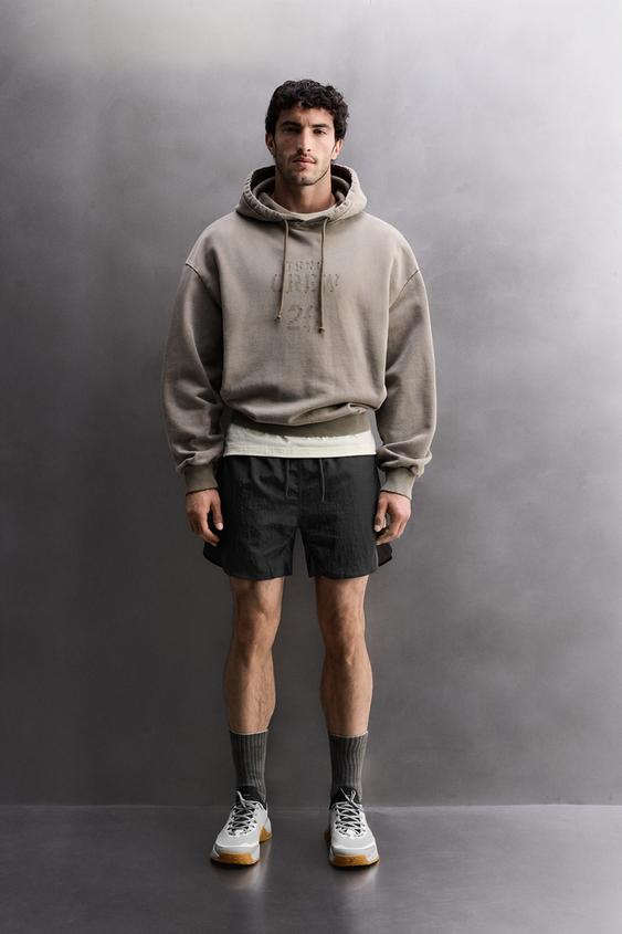 Толстовка свободного кроя с эффектом потертости