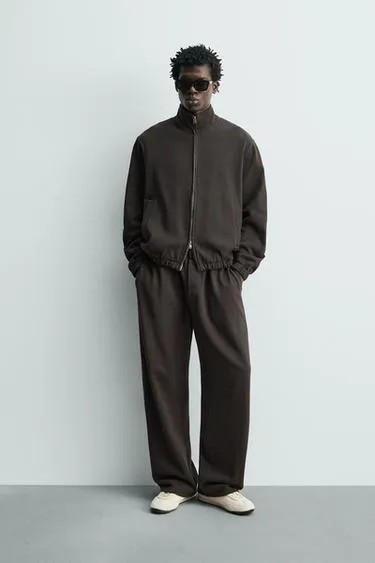 Джоггеры из трикотажа с эффектом потертости- Заказать в России