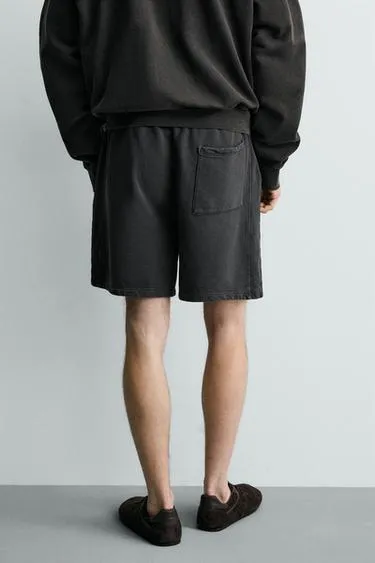 Шорты-джоггеры из ткани с эффектом потертости