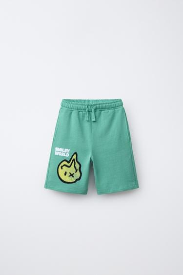 Шорты-бермуды с принтом Smileyworld ®- Заказать в России