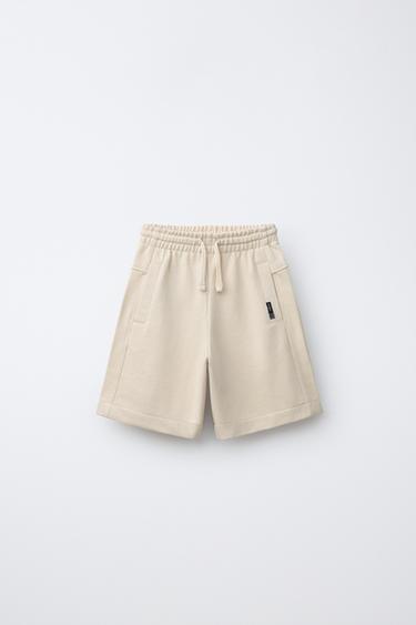 Шорты из мягкой ткани с этикеткой