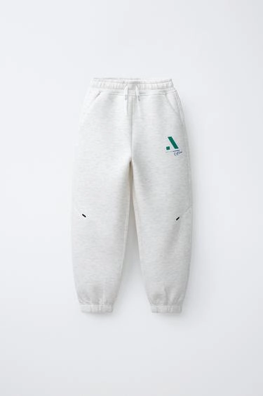 Sporty trousers with neoprene logo- Заказать в России