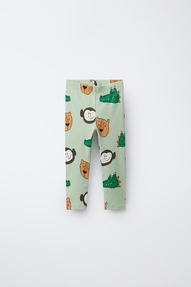 Легинсы в рубчик с анималистичным принтом