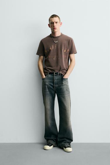 Zara Футболка с принтом и эффектом потертости купить с доставкой.