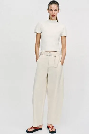 Трикотажный топ с объемными рукавами