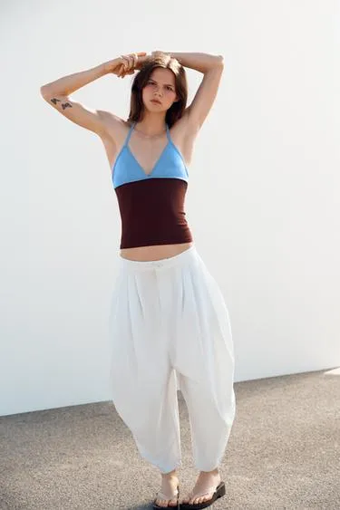 Объемные брюки со складками- Заказать в России