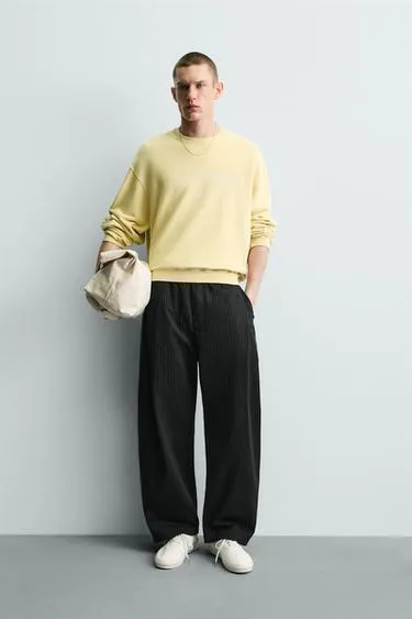 Брюки Balloon Fit с защипами