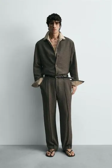 Струящиеся брюки из рельефной ткани со складками- Заказать в России