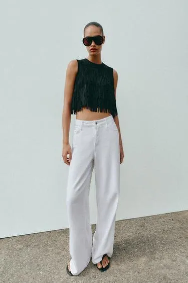 Топ из искусственной замши с бахромой и заклепками- Заказать в России