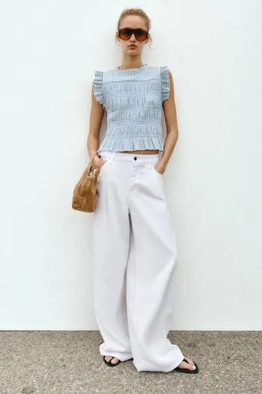 Топ с эффектом жатки в клетку виши