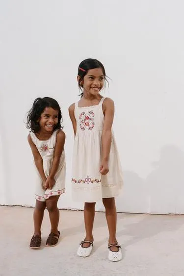 Короткий комбинезон с вышивкой крестиком- Заказать в России