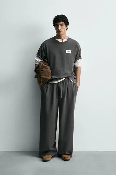 Футболка с нашивкой-этикеткой- Заказать в России