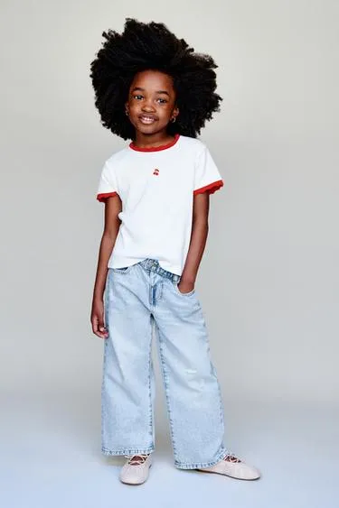 Джинсы Wide Leg с пуговицей в виде сердца- Заказать в России