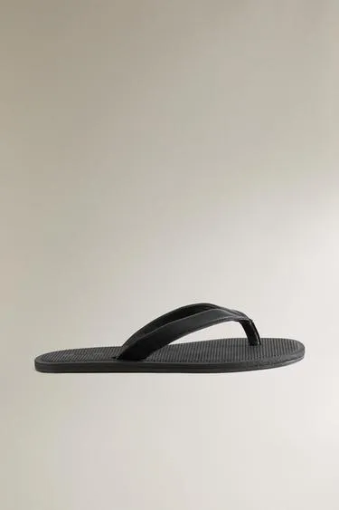 Сандалии на резиновой подошве со шнурком из кожи и межпальцевым держателем- Заказать в России