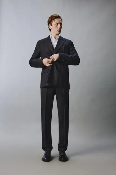 Костюмные брюки в полоску из 100% шерсти