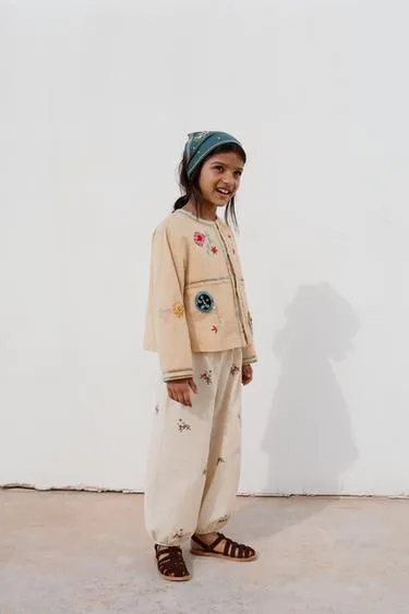 Брюки из хлопка и льна с вышивкой крестиком- Заказать в России