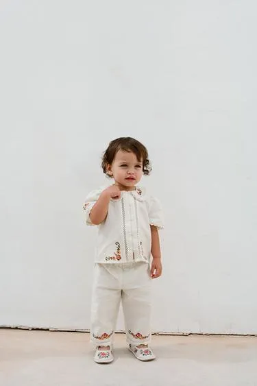 Брюки с вышивкой- Заказать в России