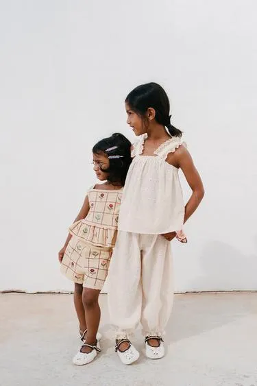 Брюки-джоггеры с вышивкой- Заказать в России