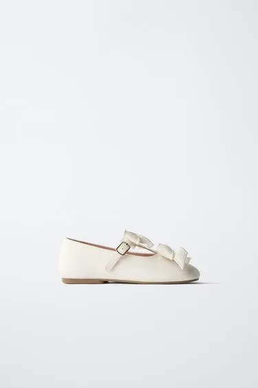 Балетки с бантами