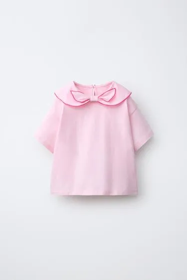 Футболка с бантом и шарфом