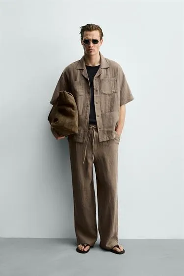 Брюки свободного кроя из 100% льна- Заказать в России