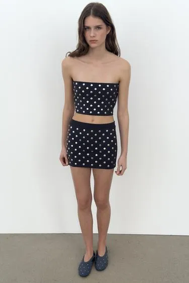 Мини-юбка с заклепками- Заказать в России