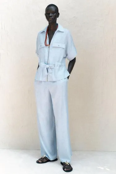 Брюки широкого кроя из льна- Заказать в России