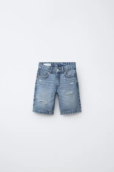 Джинсовые шорты с разрезами- Заказать в России