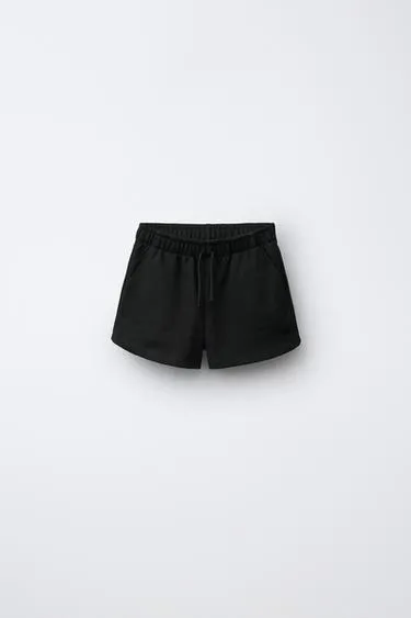 Шорты из мягкой ткани с нашивкой «звезда»- Заказать в России