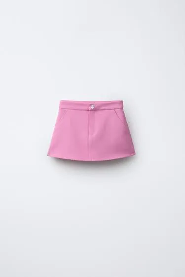 Юбка с декоративной пуговицей- Заказать в России