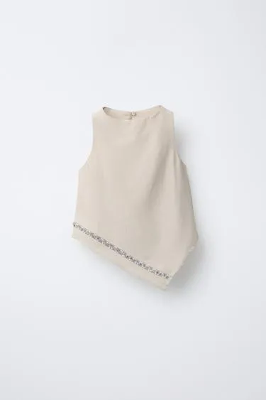 Топ асимметричного кроя со стразами- Заказать в России