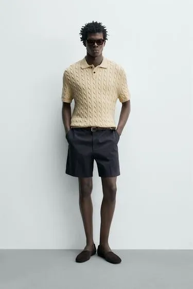 Поло из рельефного трикотажа с косами- Заказать в России