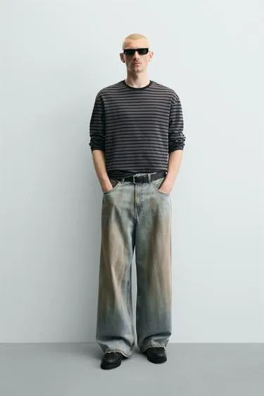 Джинсы Baggy Fit с эффектом винтажной потертости- Заказать в России