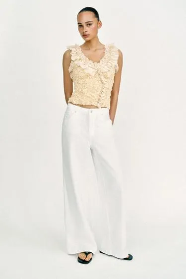 Романтический трикотажный топ комбинированного кроя- Заказать в России