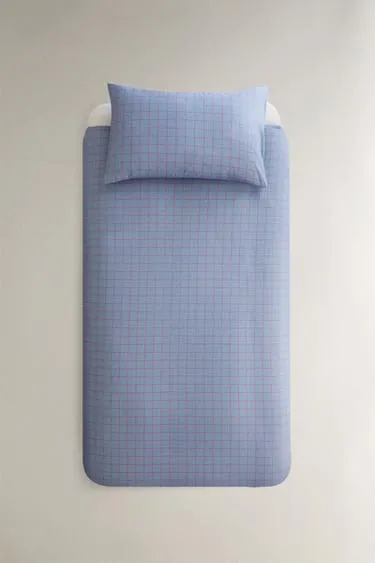 Детское одеяло с клетчатым узором