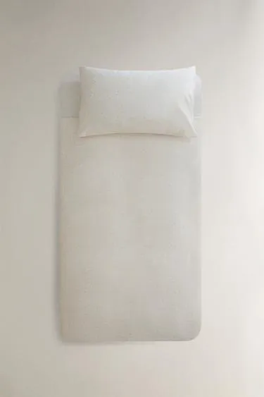 Детское постельное одеяло в горошек