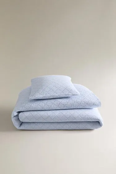 Детский одеялом с драпировкой в виде ромбов