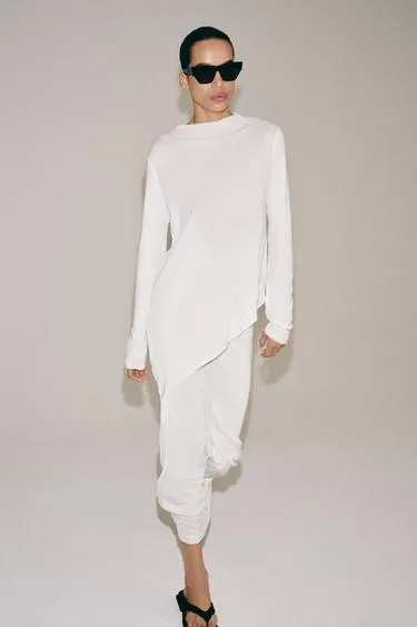 Длинный свитер асимметричного кроя- Заказать в России