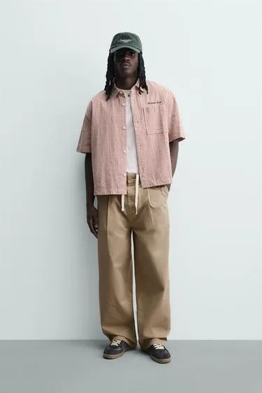 Брюки чинос Wide Fit со складками