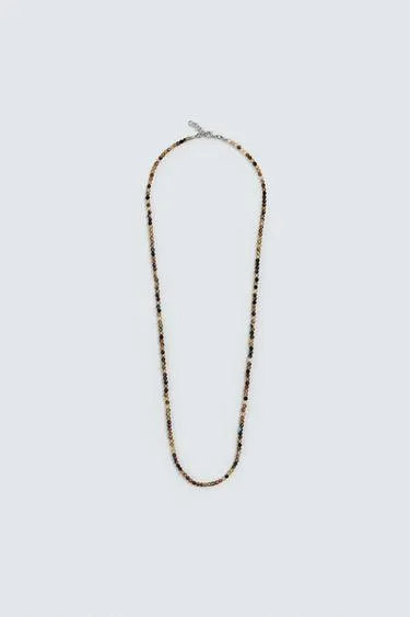 Ожерелье из каменных бусин- Заказать в России