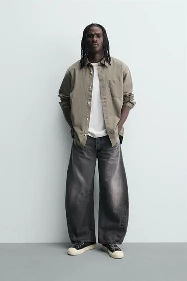 Джинсы Relaxed Barrel Fit с защипами