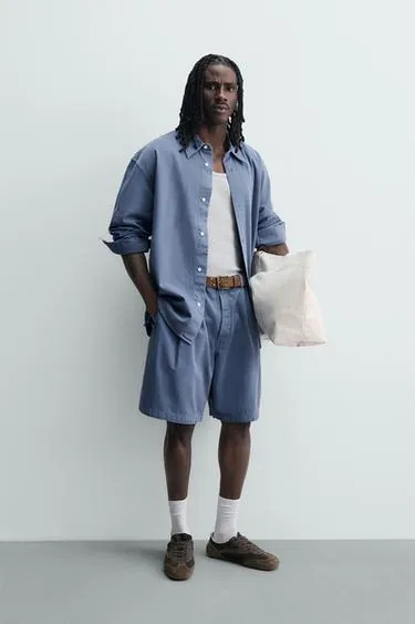 Шорты с эффектом потертости и складками- Заказать в России