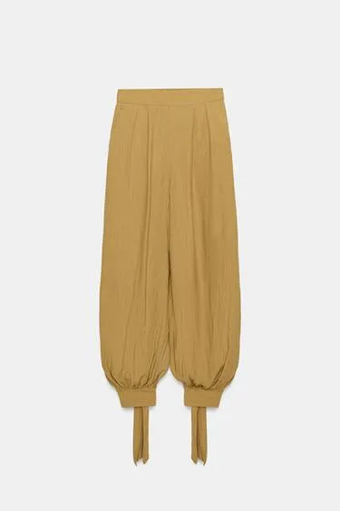 Брюки-багги с бантами