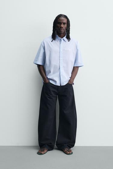 Рубашка в полоску с комбинированным принтом