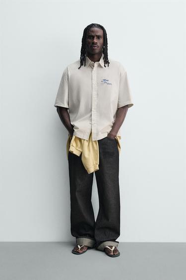 Рубашка в полоску с комбинированным принтом