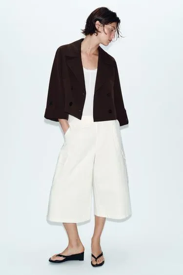 Короткий тренч с отворотами на рукавах- Заказать в России